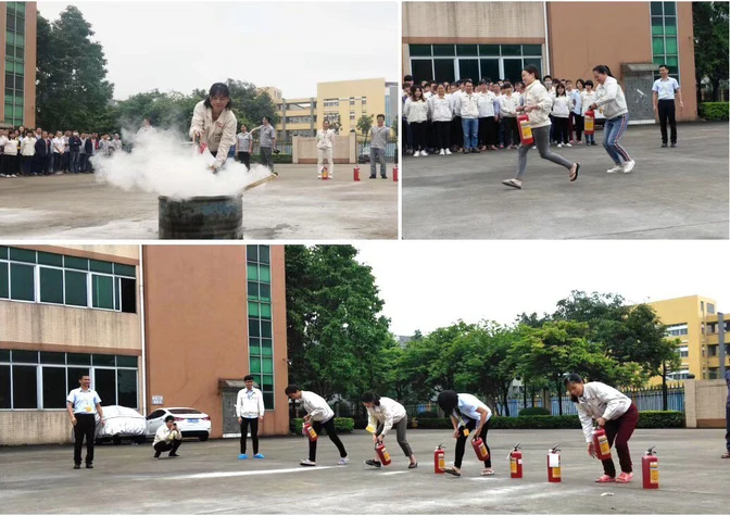 A team collaborates in an outdoor fire extinguisher training session, practicing using fire extinguishers amid smoke and fire simulations.