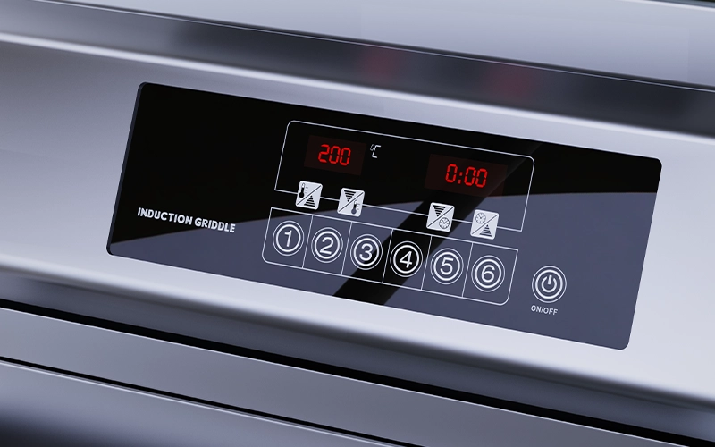 Close-up of an induction griddle's digital control panel displaying a temperature setting of 200 degrees Celsius and a timer set to 00:00, ideal for precise Teppanyaki cooking on this sleek commercial grill.