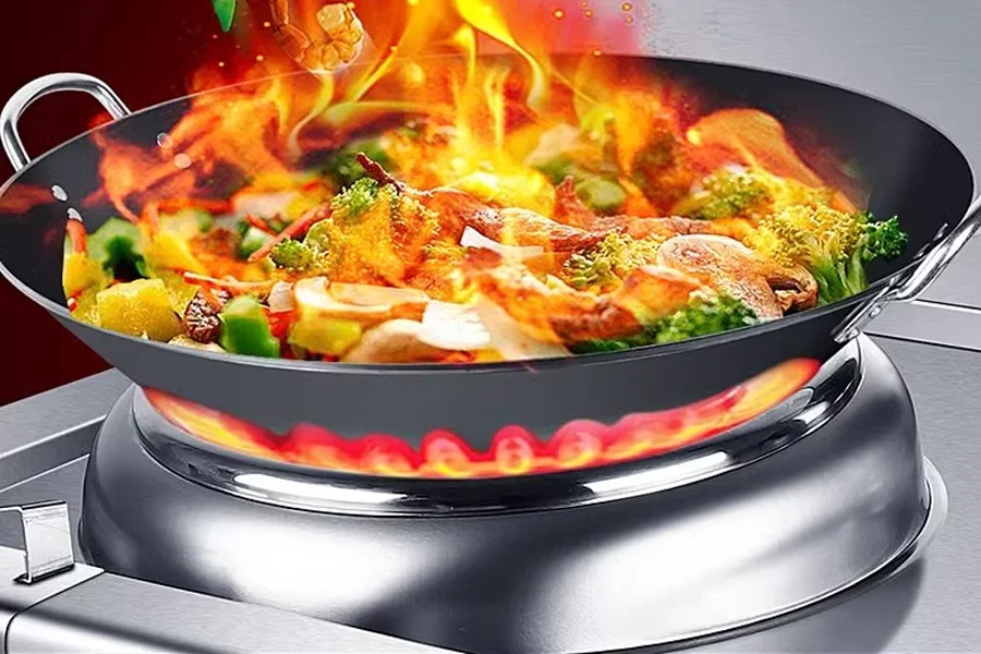 Commercial wok used for high-heat, versatile cooking in restaurant kitchens, ideal for stir-frying, steaming, and enhancing dish flavors