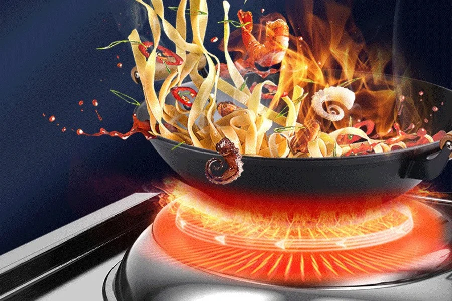 Searing seafood and noodles on a high-temperature Chinese induction wok, showcasing vibrant flames.