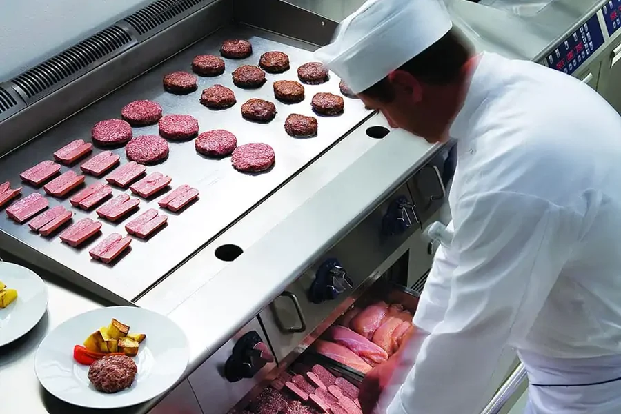 Commercial Induction Griddle — Ultimate Guide 1 Commercial induction griddle heating up in a busy kitchen