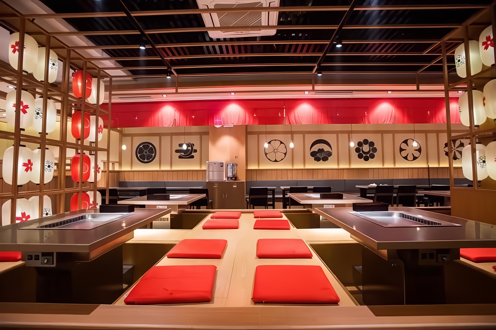Commercial smart teppanyaki grill table in Japanese style restaurant interior with ambient lighting
