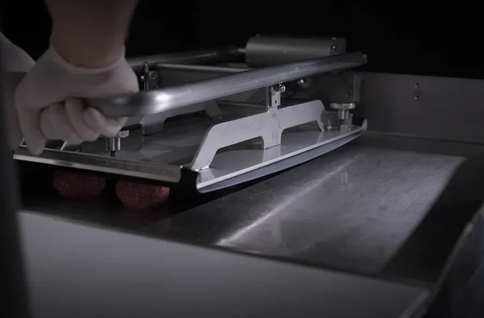 Commercial Clamshell Griddle in a Professional Kitchen